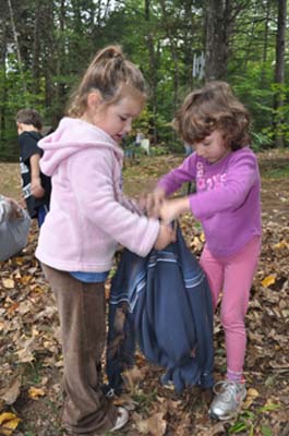 Samantha and Angelina helping each other.